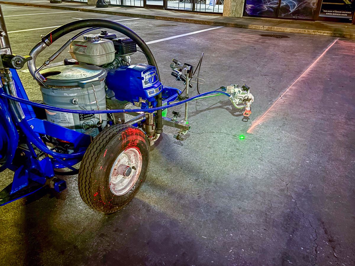 Professional Graco striping machine with laser guide